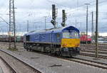 Die Class 66 653-03 von HSL rangiert in Aachen-West.