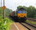 Die Class 66 DE6306 von Crossrail kommt als Umleiter aus Richtung Aachen-West,Laurensberg,Richterich mit einem MSC-Containerzug aus Antwerpen-Krommenhoek(B) nach Germersheim(D) und fährt durch