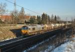 Class 66 der DLC (DE 6302) in Magdeburg Diesdorf, die Fahrt ging Richtung Braunschweig. Fotografiert am 23.12.2009. 