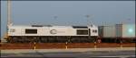 247 020-1 wird hier auf dem Jade-Weser-Port gerade an Ihren Containerzug angekuppelt.Wilhelmshaven 24/04/2014