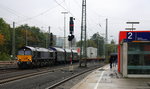 Die Class 66 266 112-2 von  Railtraxx kommt mit einem Güterzug aus Antwerpen-Waaslandhaven(B) nach Linz-Voestalpine(A) und fährt in Aachen-West ein. 
Aufgenommen vom Bahnsteig in Aachen-West. 
Bei Regenwetter am Nachmittag vom 20.10.2016. 