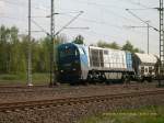 Eine G 2000 durchfhrt am 04.05.06 mit einem Gterzug den Bahnhof Muldenstein in Richtung Berlin.