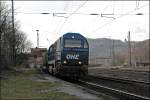 Eine OHE G2000 durchfhrt mit einem Holzzug den ehemaligen Bahnhof Westhofen.