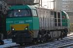 Vossloh 2006 (ex R4C) legt sich am 4.12.10 als Lz in Dsseldorf-Rath in die Kurve.Aktuell scheint die Lok von einem neuen Unternehmen getestet zu werden,da an diesem Tag und auch an dem Tag davor