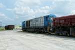 Mak G 2000 mit Split zur Entladung im Anschluss des Bahnhofs Pasewalk-Ost, hier am Mittag des 09.06.2006.