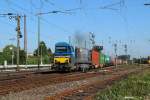 HGK DH 752 mit einem Containerzug in Dsseldorf-Rath am 16.09.2012