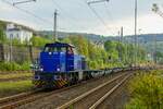 275 111 MaK G 1206 mit leeren Tragwagen in Wuppertal Steinbeck, April 2024.