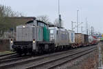 BUVL 295 073-1 zieht Metrans 386 024-4 mit ihrem Containerzug in den Hafen von Duisburg in Rheinhausen 16.1.2025