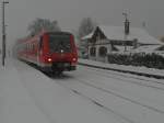 Auf der Fahrt von Ulm nach Basel Bad. Bf passiert IRE 3354 am 30.12.2014 die Haltestelle Löwental in Friedrichshafen.