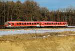 Der Filzenexpress von Wasserburg / Inn nach München Ost am Abend des 20.02.21 in der Landschaft.