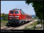 06.06.2011: 218 400 verlsst mit einem 628 im Schlepp als RB 27118 von Simbach kommend den Bahnhof Tging in Richtung Mhldorf