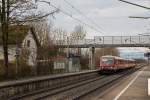 628 584-5 wurde mit seinem Schwesterfahrzeug auf seiner Fahrt von München Hbf nach Mühldorf bei der Durchfahrt am Haltepunkt Grub im Bild festgehalten. (10.01.16)