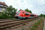 BR 641 005-4. Nur wenige Minuten nach dem Regionalzug nach Lauchringen gingen die Schranken wieder runter und der Gegenzug nach Basel kam angerauscht. Bei Rhina (Landkreis Waldshut) am 1.7.2007.