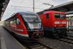 Hier links 642 530-0 als RE56 (RE16113) von Nordhausen nach Erfurt Hbf. und rechts 143 139 mit einer RB59 (RB16372) von Erfurt Hbf. nach Sangerhausen, diese beiden Züge standen am 19.8.2014 in Erfurt Hbf.