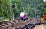 Zwei Euregiobahn (RB20) kommt aus Langerwehe-Stolberg-Altstadt nach Heerlen(NL) aus Richtung Aachen-West,Laurensberg,Richterich und hält in Kohlscheid und fährt in Richtung Herzogenrath.
Bei Sonne und Wolken am Morgen vom 4.6.2014.