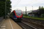 Zwei Euregiobahn (RB20) aus Heerlen(NL)-Stolberg-Altstadt-Düren kommt die Kohlscheider-Rampoe hoch aus Richtung Herzogenrath und hält in Kohlscheid und fährt in Richtung Richterich,Laurensberg,Aachen-West. 
Bei Sonne und Wolken am Morgen vom 4.6.2014.