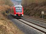 648 106 ist am 23.03.2011 mit RE 57 auf dem Weg nach Dortmund Hbf, hier bei Arnsberg-Rumbeck.