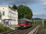 648 838 (LINT 41, ein Dieseler auf elektrifizierter Strecke) als RB 21878 Büchen - Aumühle; im EG (Baujahr 1846 und somit eines der ältesten in Deutschland) des ehemaligen Bahnhof