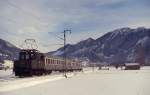 Im Januar 1979 hat 169 002-3 mit ihrem Personenzug nach Murnau den Bahnhof Overammergau verlassen