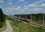 RE 4013 mit 101 026-1 nach Mnchen Hbf kurz vor der Einfahrt in Allersberg (Rothsee), 02.08.2011