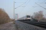 IC 2320 mit 101009-9 am 28.01.2012 um 10.02 Uhr mit Versptung auf dem Weg von Frankfurt nach Hamburg kurz vor der berquerung des Dortmund-Ems Kanals bei Mnster