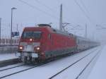 Als 101 022 mit ihren IC Binz-Frankfurt/Main,am 06.Dezember 2012,Bergen/Rgen erreichte ging es mit dem Schneefall erst richtig los.