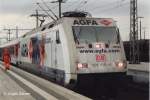 E 101 115-5 mit Werbung  Agfa  hat in Itzehoe den IC aus Westerland auf den Haken genommen und wartet auf das Abfahrsignal nach Hamburg (Apr.2001).Das Ferkel msste sich mal waschen!!!