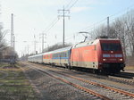101 020-6 mit dem EC in Richtung Hamburg über Berlin auf dem  südlichen Berliner Außenring bei Diedersdorf am 26. März 2016.

