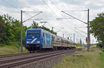 101 133 der Traincharter oblag am 09.06.24 die Bespannung des Säuferzuges vom Flughafen Leipzig/Halle nach Köln. Hier passiert der Zug in Fahrtrichtung Dessau Greppin.