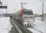 Hier 101 144 mit IC2352 von Stralsund nach Erfurt Hbf., bei der Ausfahrt am 12.2.2010 aus Angermnde.