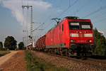 Mit einem gemischten Güterzug aus Mannheim fuhr am 13.09.2016 die 145 035-2 bei Müllheim (Baden) in Richtung Basel auf der KBS 703.