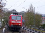 145 045-1 DB  kommt aus Richtung Aachen-West mit einem LKW-Zug aus Zeebrugge-Ramskapelle(B) nach Novara(I) und fährt durch Aachen-Schanz in Richtung Aachen-Hbf,Aachen-Rothe-Erde,Stolberg-Hbf(Rheinland)Eschweiler-Hbf,Langerwehe,Düren,Merzenich,Buir,Horrem,Kerpen-Köln-Ehrenfeld,Köln-West,Köln-Süd. 
Aufgenommen vom Bahnsteig von Aachen-Schanz. 
Bei Regenwetter am Morgen vom 16.3.2018.