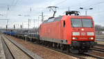 DB Cargo Deutschland AG  mit  145 073-3  [NVR-Number: 91 80 6145 073-3 D-DB] und einem Gütertransportzug mit polnischen Stahlprodukten am 29.01.19 Bf. Flughafen Berlin-Schönefeld.