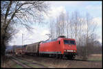 DB 145054-3 ist hier mit einem Güterzug in Richtung Osnabrück am 25.3.2004 um 9.42 Uhr in der Bauernschaft Lengerich - Schollbruch unterwegs.