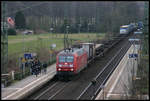 145038 fährt hier am 3.2.2007 mit einem Container Zug in Richtung Osnabrück durch den Bahnhof Natrup Hagen.