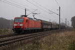 DB Cargo 145 047 zog den leeren Papierzug nach Schwedt am 23.11.2022 durch Herzsprung.