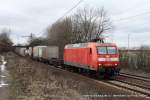 145 018-8 (DB) fhrt am 27. Februar 2010 um 14:11 Uhr mit einem Gterzug durch Ahlten