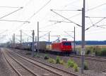 Mit einem Gterzug von Aachen kommend hat die 145 CL 014 gleich den Bahnhof Buir erreicht. Da der Zug aus lauter Containern Schweizerherkunft besteht drfte das Ziel zu erahnen sein. Samstag 24.7.2010