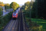 145 011-3 von Railion kommt aus Richtung Koblenz mit einem langen Containerzug aus Italien nach Kln und fhrt in Richtung Kln auf der Rechten Rheinstrecke (KBS 465) bei Bad-Honnef am Rhein bei tollem Herbstwetter am 2.10.2013. 