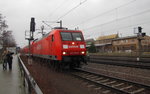 Railion 145 042-8 mit dem RE 16717  SAXONIA  von Leipzig Hbf nach Dresden Hbf, am 02.01.2012 in Oschatz.