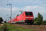 Mit einer RB (Offenburg  - Neueburg (Baden)) fuhr am 07.06.2018 die Freiburger 146 213-4 nördlich von Müllheim (Baden) in Richtung des dortigen Bahnsteiges, wo sie ihren vorletzten Zwischenhalt einlegen wird.