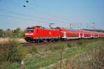 146 107-8 ist am Vormittag des 19.04.2011 mit dem RE aus Norddeich Mole auf der KBS 380 Richtung Hannover unterwegs.