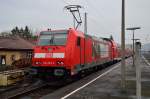 Die Werbelok 146 223-3 steht in Neckarelz mit ihrem Dostock RB-Zug auf Gleis 12 am Montag den 3.3.2014