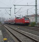 146 011 mit der S1 nach Schöna am Haken fährt am 30.10.2015 in den Bahnhof Dresden-Neustadt ein. 