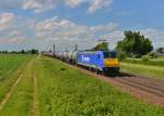 146 521 mit einem Kesselzug am 01.06.2015 bei Plattling.