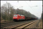 152059 fährt hier am 18.03.2006 um 16.23 Uhr mit einem Güterzug in Richtung MÜnster durch den damals noch viergleisigen Bahnhof Natrup Hagen.