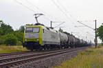 Mit einem Kesselwagenzug rollte 152 197 der Captrain am 21.06.24 durch Greppin Richtung Dessau.