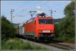 Bei Ltzelsachsen ist 152 136 am 24.6.2007 mit einem Zug aus polnischen Kohlewagen unterwegs.