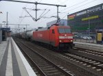 152 003-0 mit einem gemischten Gterzug durch Bielefeld. 01.02.2011.
