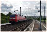 152 036-0 mit einen Aufliegerzug Richtung Norden in Retzbach-Zellingen am 08.05.14.